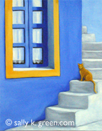 orange cat sitting on steps